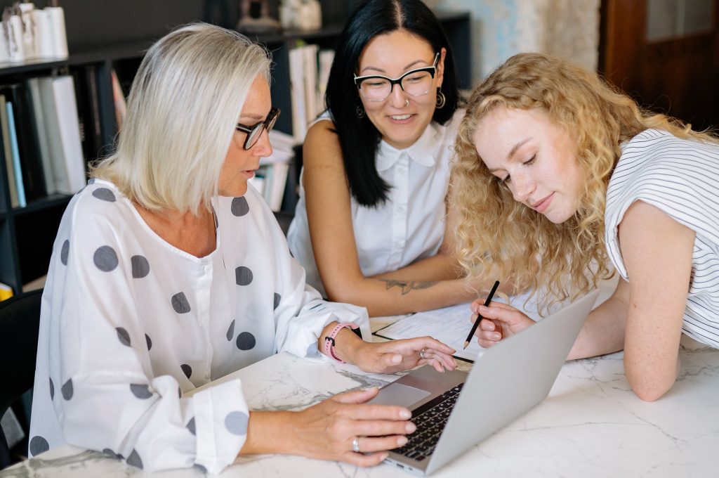 Women around laptop